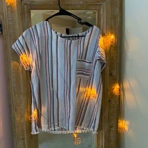 Small pink blue and white striped shirt